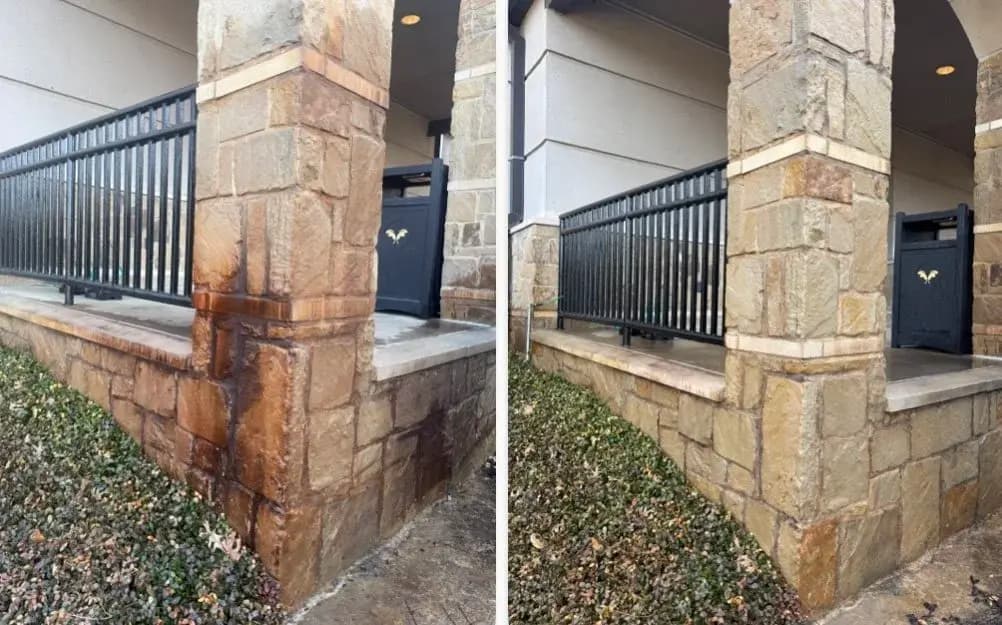Stone columns and iron fencing after cleaning